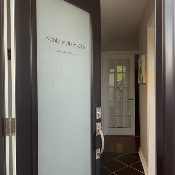 Open door for Noble Mind and Body office in Greater Toronto Area showing you the interior clinic.